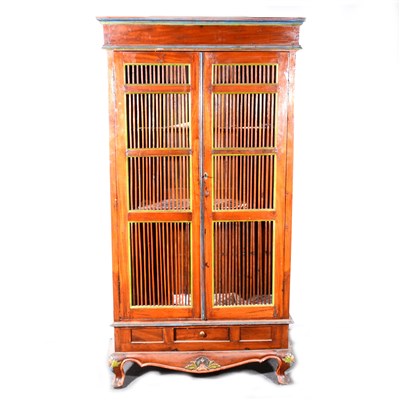 Lot 298 - An Indian stained and painted wood cupboard