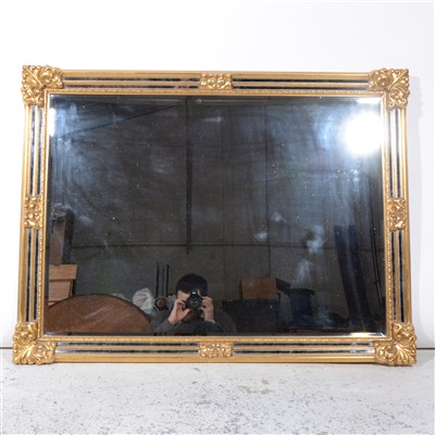 Lot 327 - A reproduction gilt framed wall mirror