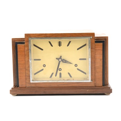 Lot 133 - An Art Deco walnut case mantel clock