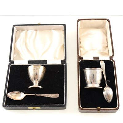 Lot 206 - A silver spoon and egg cup by William Base & Sons, cased, Birmingham 1929-30, and another by Cooper Brothers & Sons, cased, Sheffield 1967, total weight approx. 3.4oz.