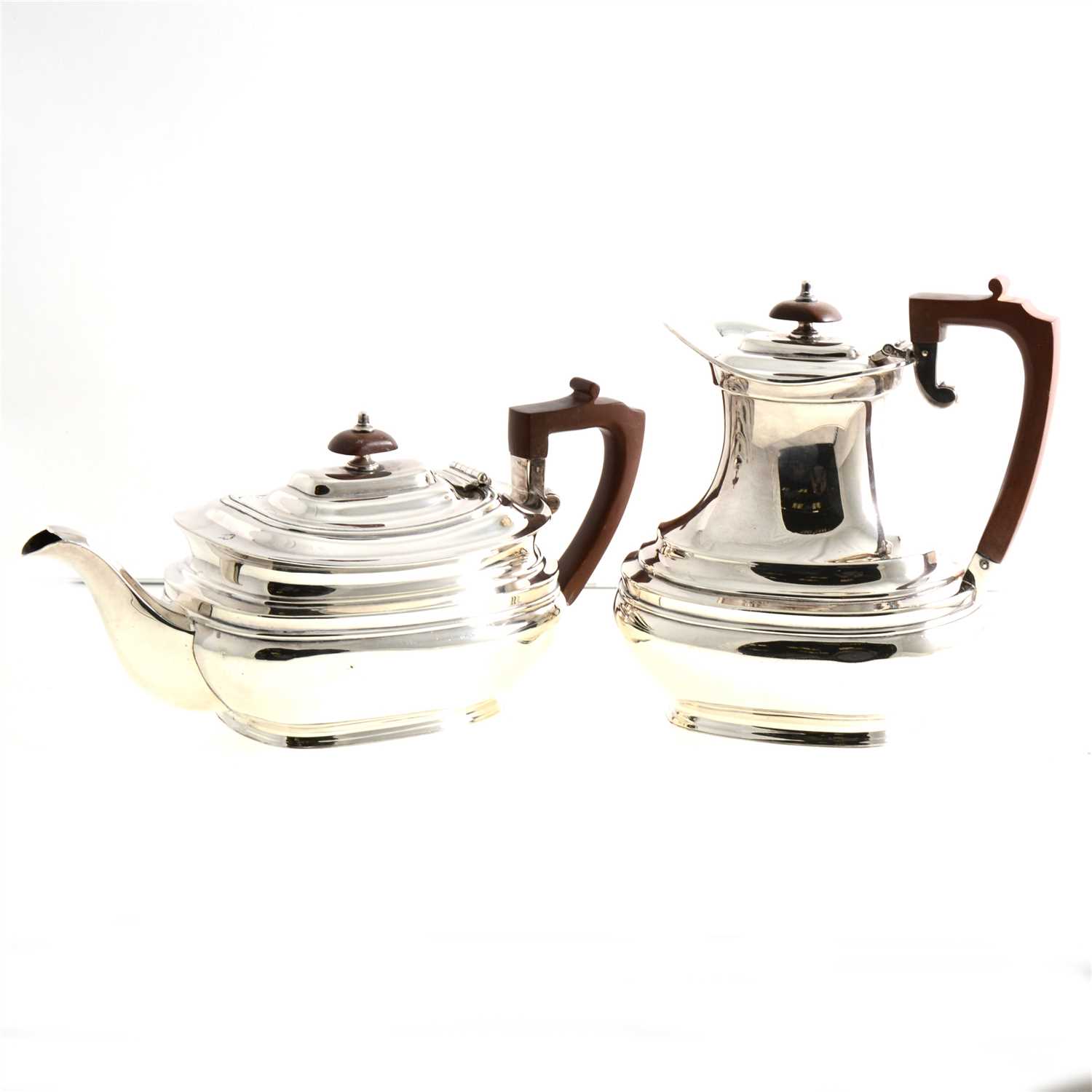 Lot 195 - A Georgian design silver teapot and hot water jug by George Tarratt Ltd, brown wooden handles and finials, Sheffield 1961, total gross weight approx. 38.8oz.