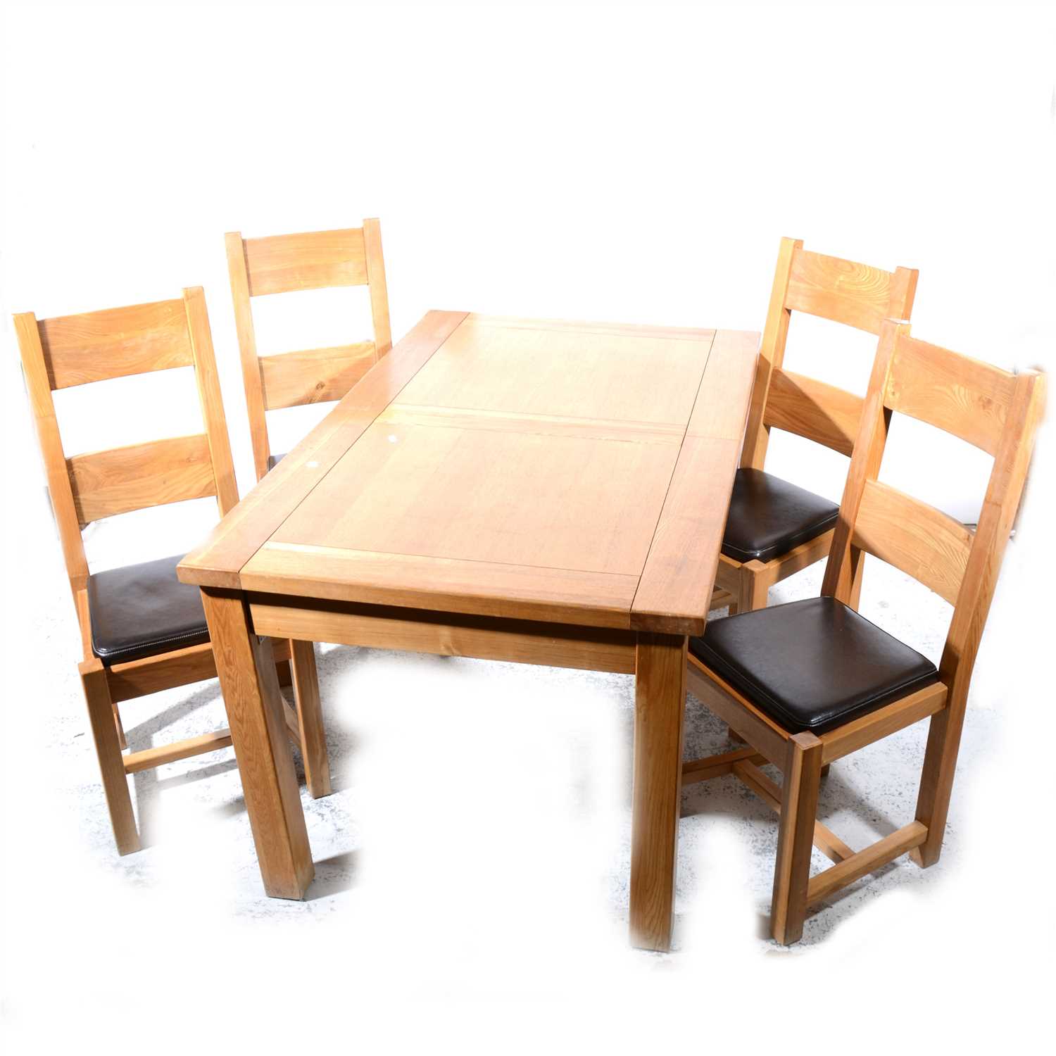 Lot 332 - A contemporary oak extending kitchen table, and six chairs