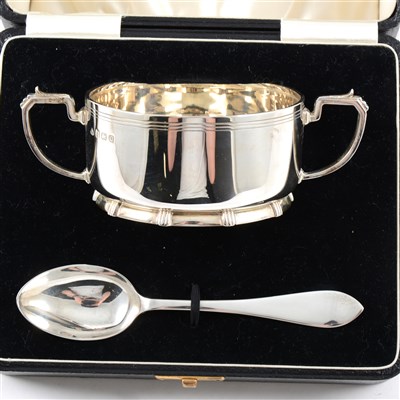 Lot 175 - A silver twin-handled porringer and spoon by Adie Brothers Ltd, in presentation case from Pearce & Sons Ltd, Silversmiths, Leicester, Birmingham 1940, total weight approx. 6.1oz.