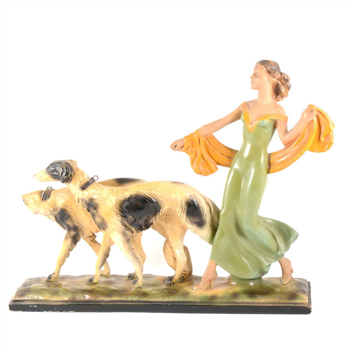 Lot 87 - An Art Deco painted plaster group, Lady with Borzoi