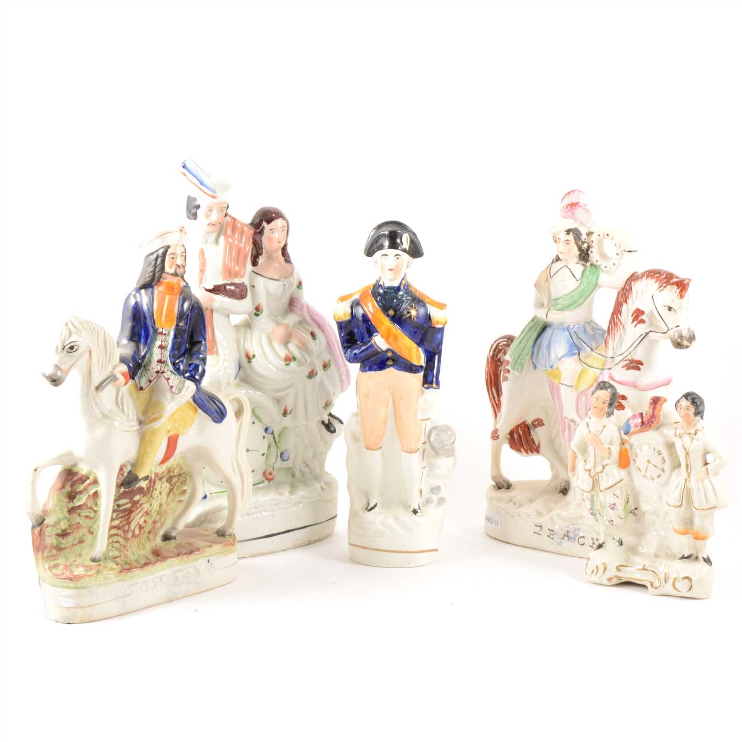 Lot 54 - A Staffordshire equestrian figure, Prince of Wales, and a collection of other figures and groups.