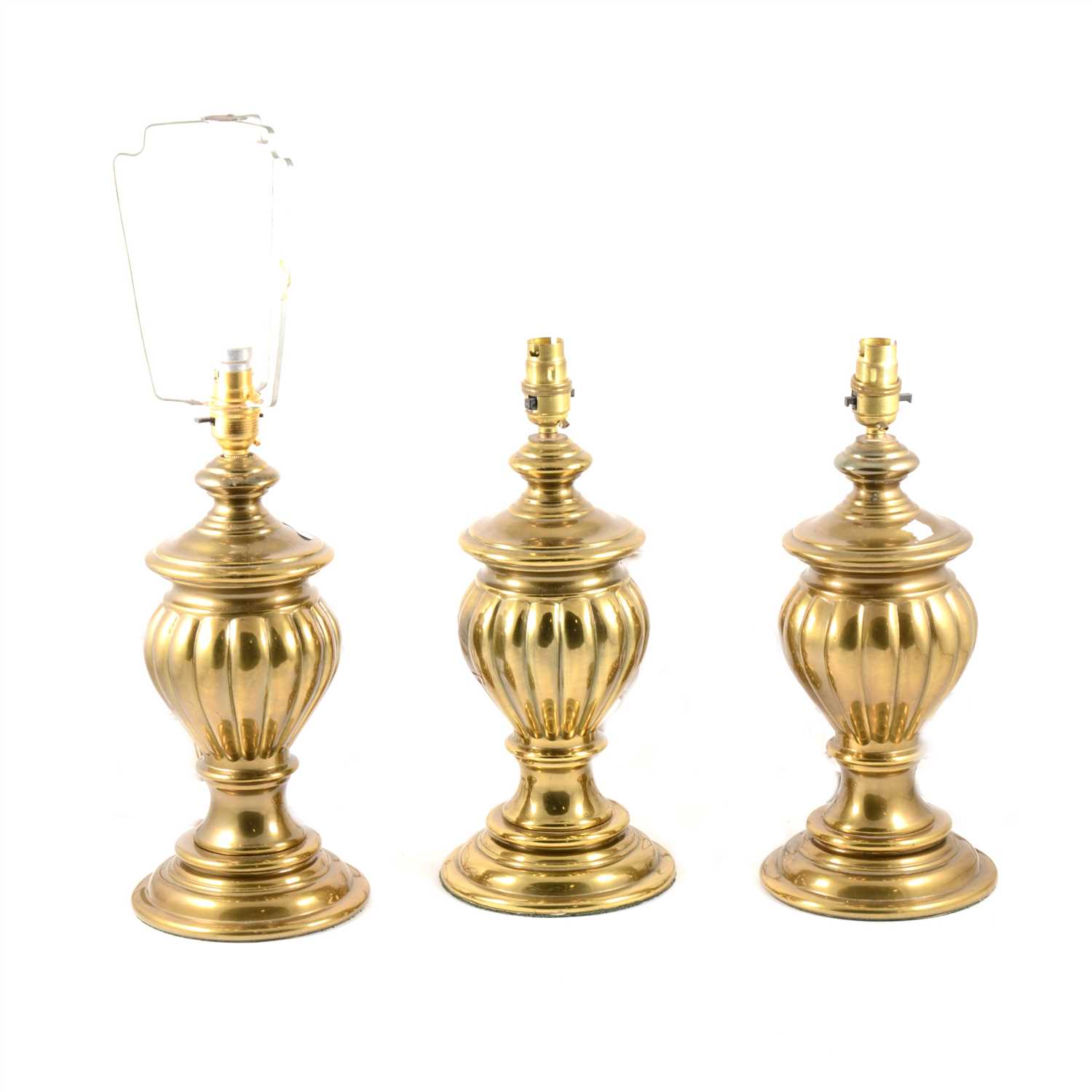 Lot 233 - Three lacquered brass lamp bases, and an opaque glass shade.