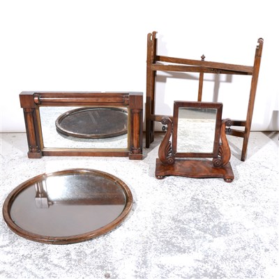 Lot 320 - An oak circular butler's table, a mahogany wall mirror and a mahogany  toilet mirror