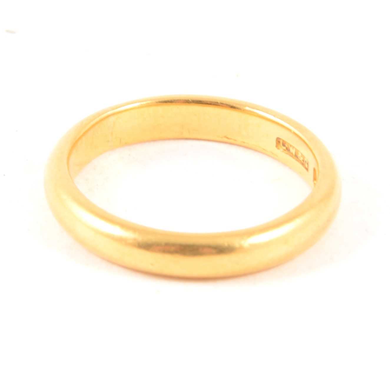 Lot 223 - A 22 carat gold wedding band, 3mm wide D shape, approximate weight 4.8gms, ring size L.