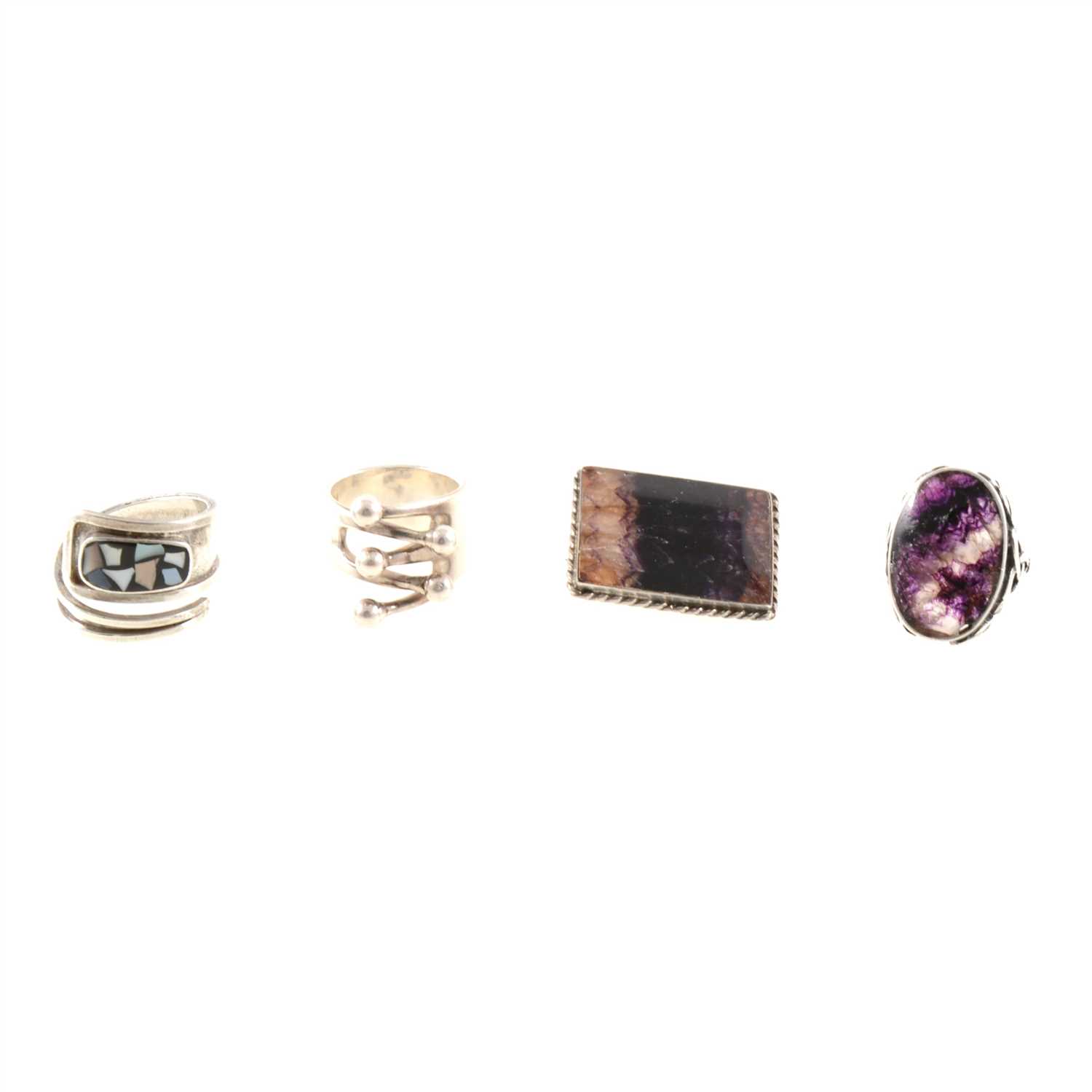 Lot 226 - A silver ring and brooch set with blue john, and two vintage chunky silver rings from Norway and Israel.