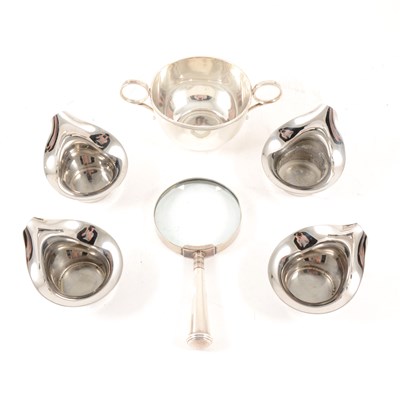 Lot 218 - Four Georg Jensen candle holders, a silver handled magnifying glass and a small silver twin handled bowl by CCP, Birmingham, date mark rubbed, weight approx. 3.7oz.
