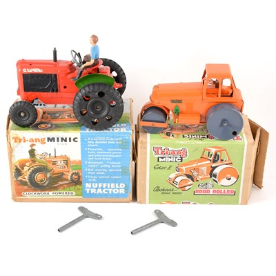 Lot 89 - Tri-ang Minic toys; Nuffield tractor with driver and smoke powder, Avling Barford road roller, both boxed.