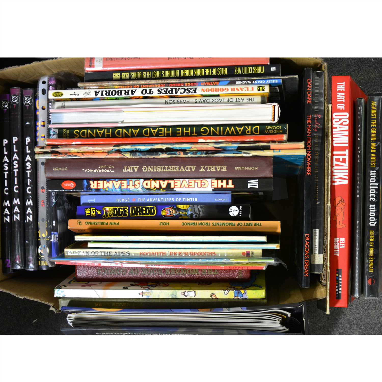 Lot 315 - Three boxes of books, including graphic novels, comic art, drawing, comic books and art.