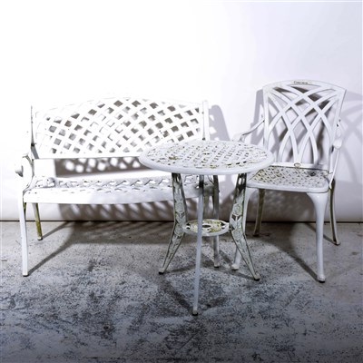 Lot 337 - A white painted metal garden bench, two similar patio chairs and a table.