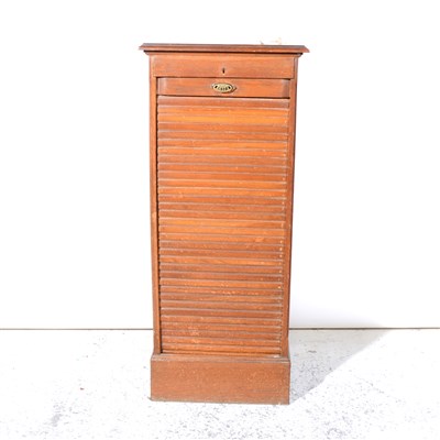 Lot 383 - Oak and stained wood tambour front filing cabinet.