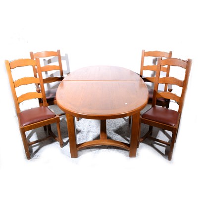 Lot 518 - A contemporary oak dining room suite, ...