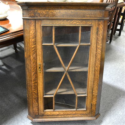 Lot 373 - An oak hanging corner cupboard, ...