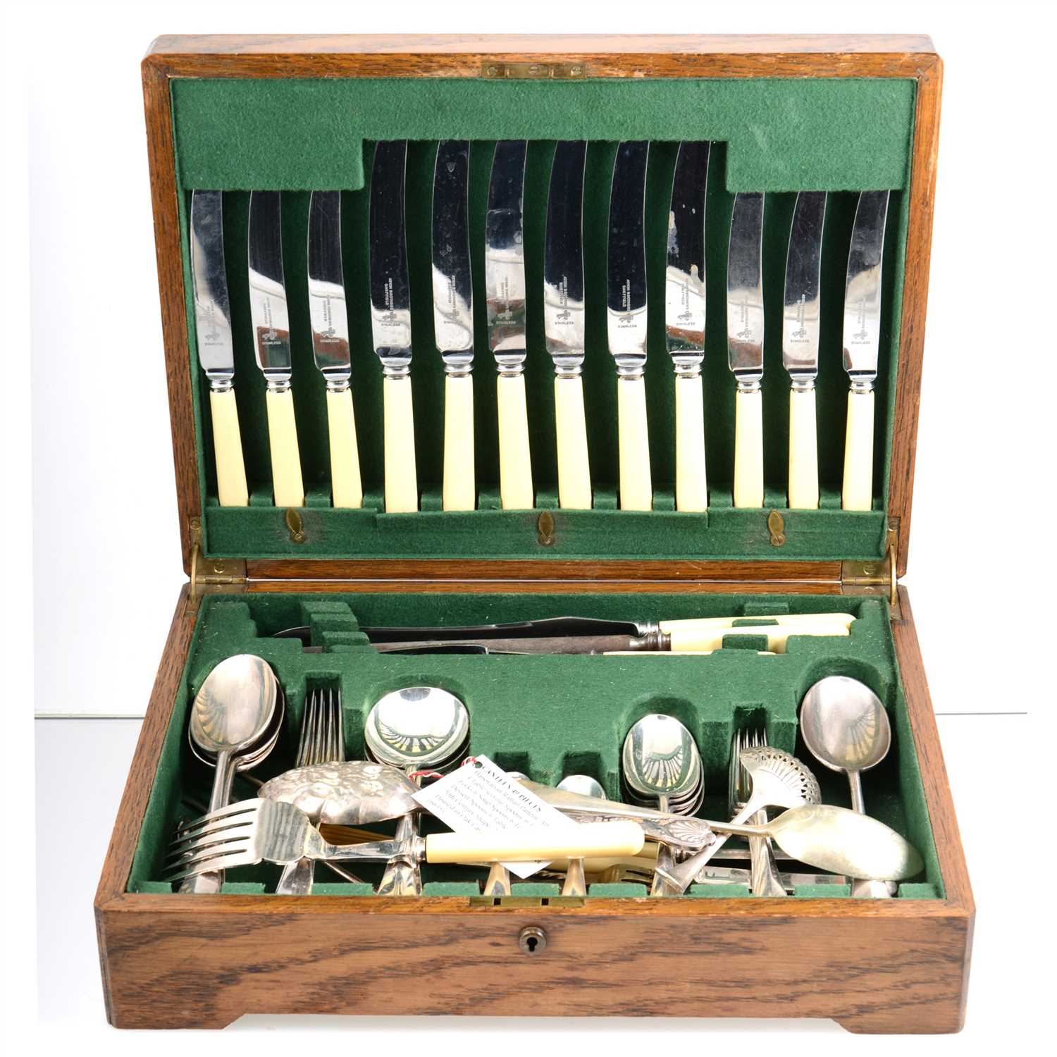 Lot 61 - A silver plated canteen of cutlery by Atkin Brothers, rattail pattern, 6 place settings, in oak case, and another by Walker & Hall, rattail pattern, 6 place settings, almost complete, in dark oak case