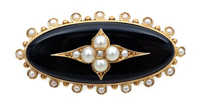Lot 365 - A Victorian black onyx and pearl brooch.