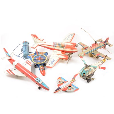 Lot 74 - Six tin-plate aircraft toys.