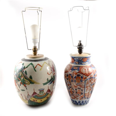 Lot 73 - Imari baluster shaped vase, lightly fluted, floral decoration in a traditional palette, 32cm