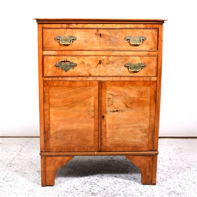 Lot 551 - Victorian mahogany cabinet, adapted from a night table, top with crossbanding, now fitted with two drawers, over two doors, 61cm.