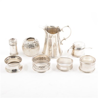 Lot 245 - A collection of five silver napkin rings