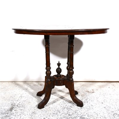 Lot 364 - An oval occasional table on four turned supports with centre finial.86cm x 52cm