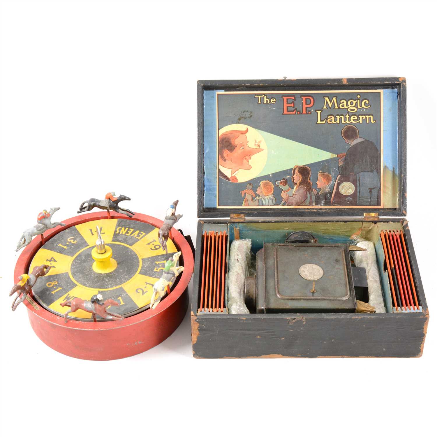 Lot 98 - The E.P. Magic Lantern boxed, horses racing game and Victorian toy tea set.