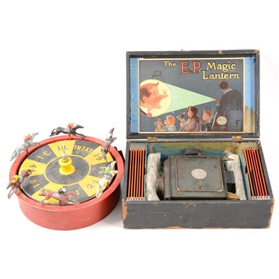 Lot 98 - The E.P. Magic Lantern boxed, horses racing game and Victorian toy tea set.