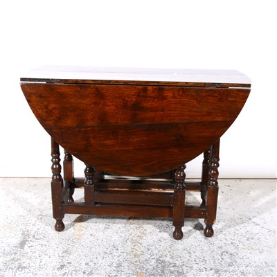 Lot 362 - Joined oak table, oval top with two drop leaves