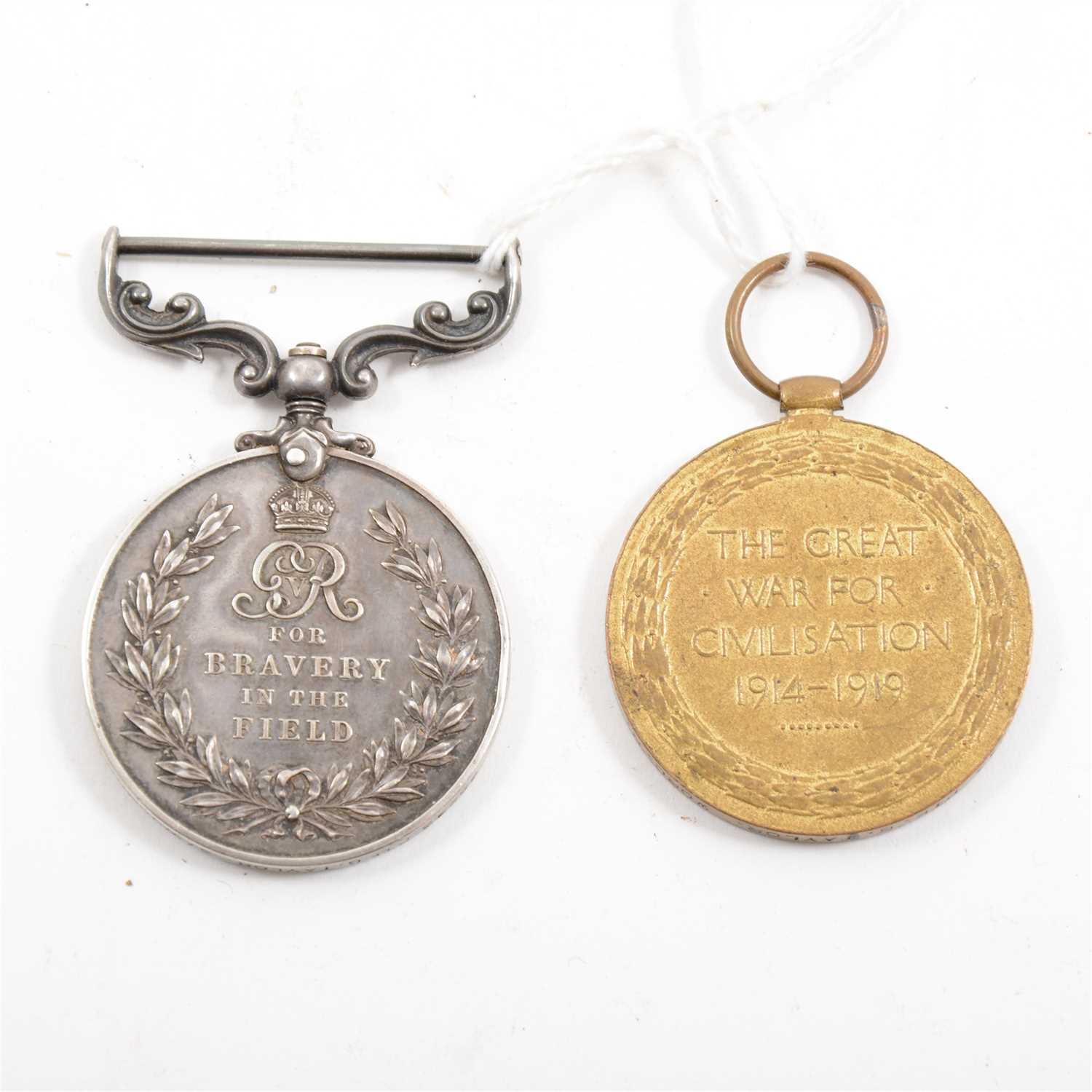 Lot 168 - George V Military Medal for Bravery In The Field and a Victory Medal.