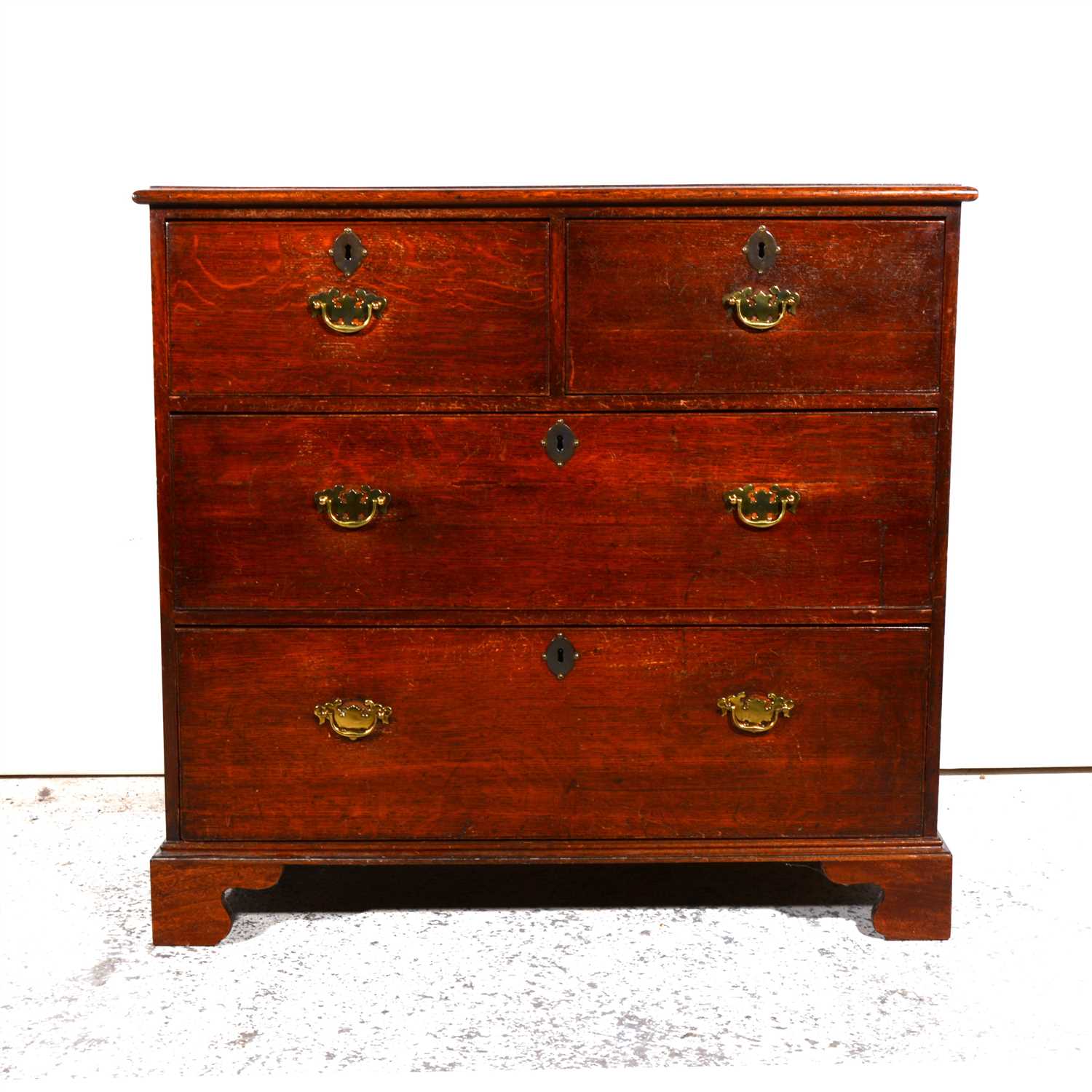 Lot 351 - George III oak chest of drawers.