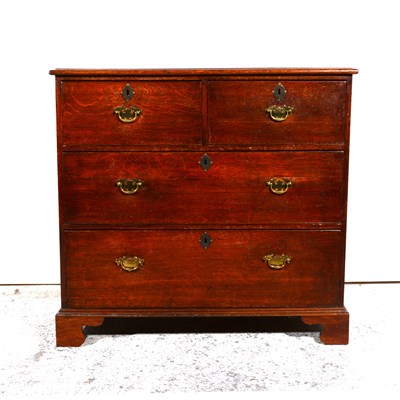 Lot 351 - George III oak chest of drawers.