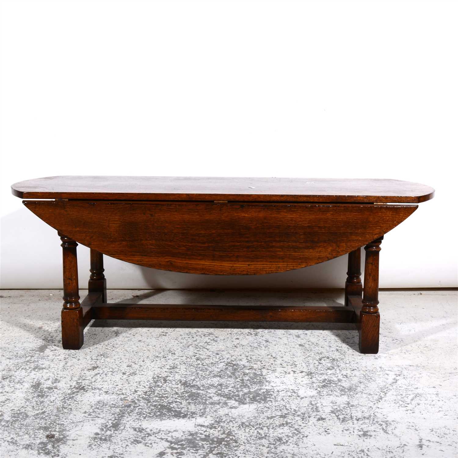 Lot 377 - Large oak drop-leaf coffee table