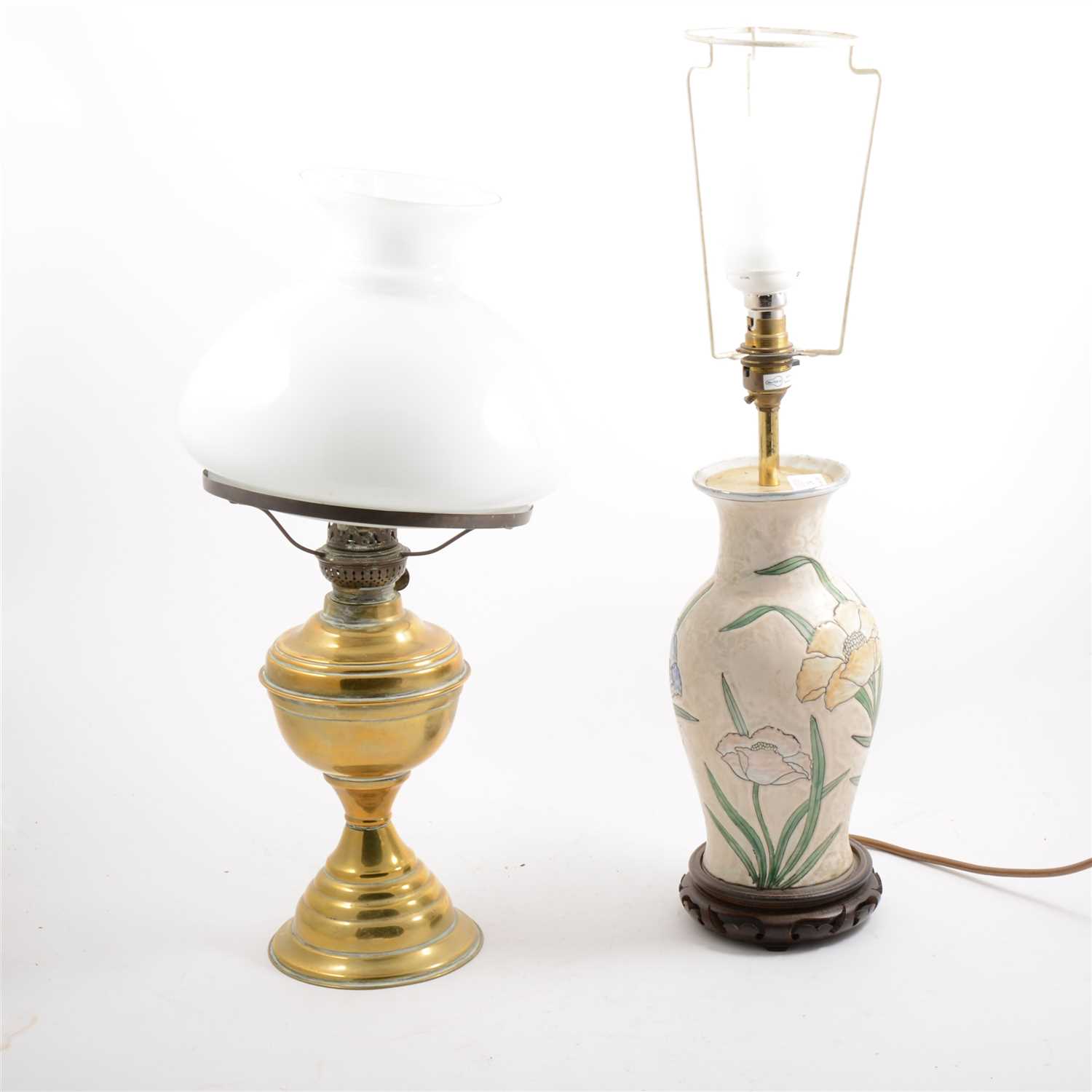 Lot 236 - A brass oil lamp and a pottery base table lamp