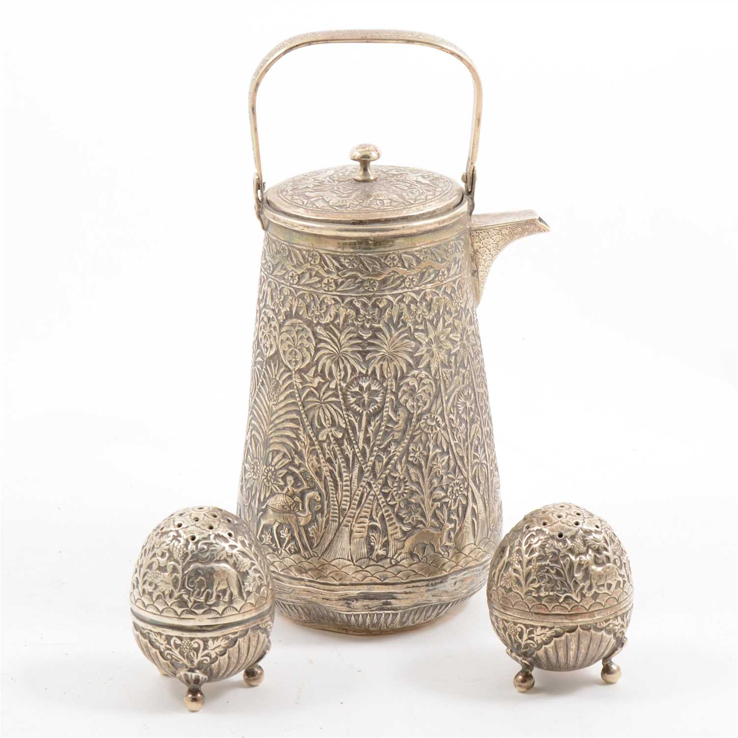 Lot 117 - Indian white metal hot water jug, and two white metal egg-shaped cruets