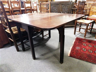 Lot 516 - A Victorian mahogany drop-leaf dining table, ...