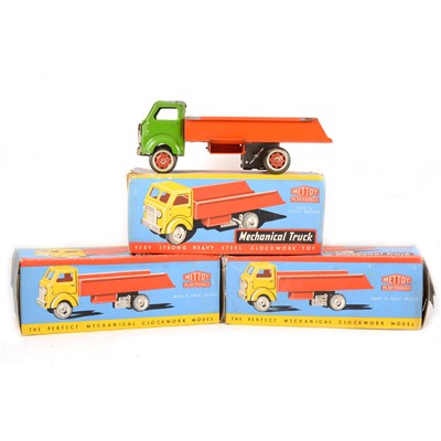 Lot 65 - Mettoy Playthings Toys; tin-plate heavy steel clockwork trucks, (x3), no.3192. all boxed all (a/f).