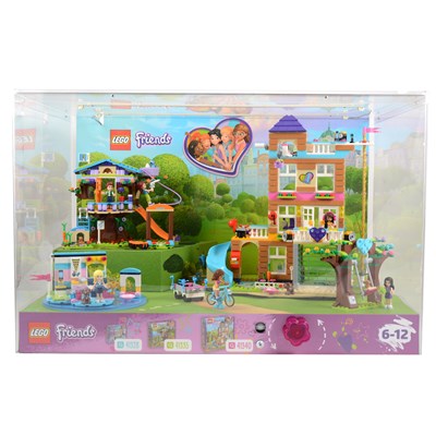 Lot 306 - Lego 'Friends' shop display model; a scene with houses, shop, people, bike riders and sing