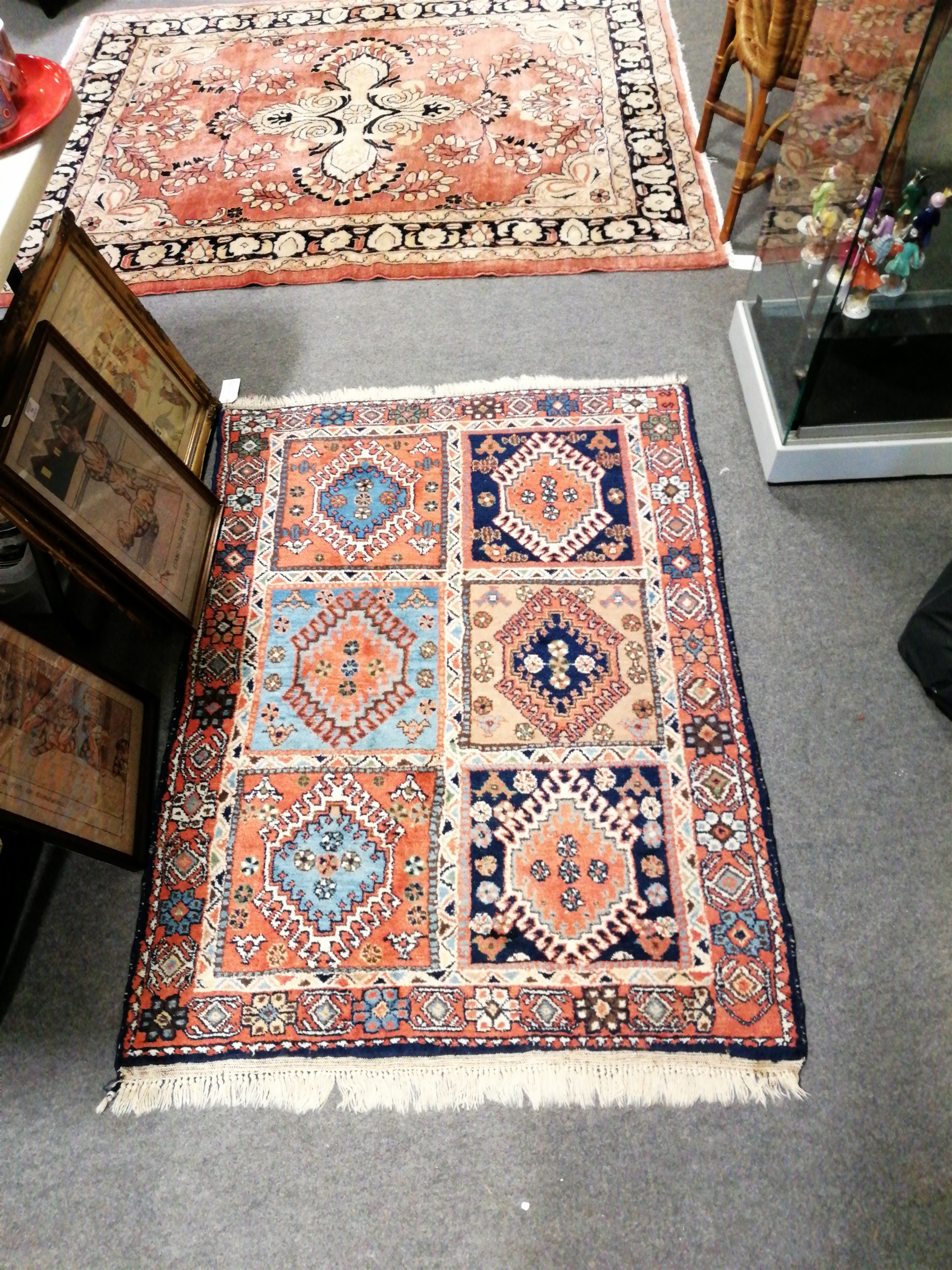 Lot 586 A Persian design rug, made in Turkey.