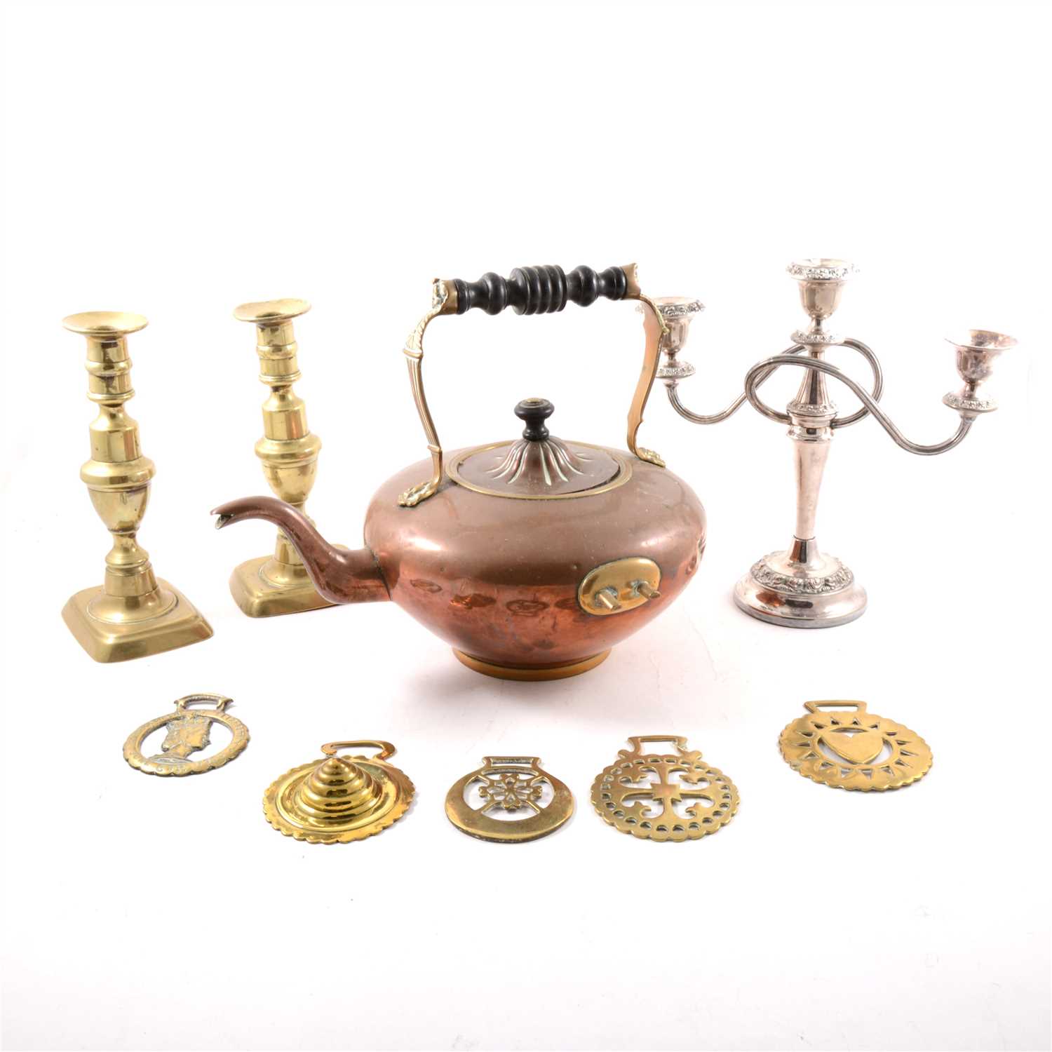 Lot 129 - A copper kettle on a stand, copper warming pan, copper coal bucket, candlesticks, brasses etc.