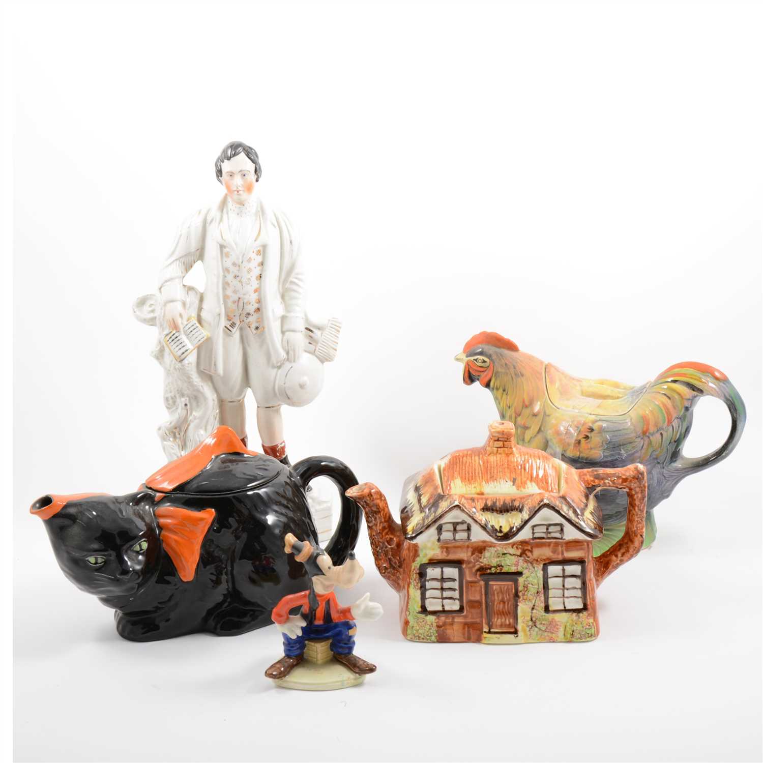 Lot 52 - Five novelty teapots, three Staffordshire figures, Beswick Goofy figure, etc.