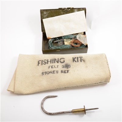 Lot 84 - Military issue tropical fishing kit and general survival information, in tin, and two outer sleeves