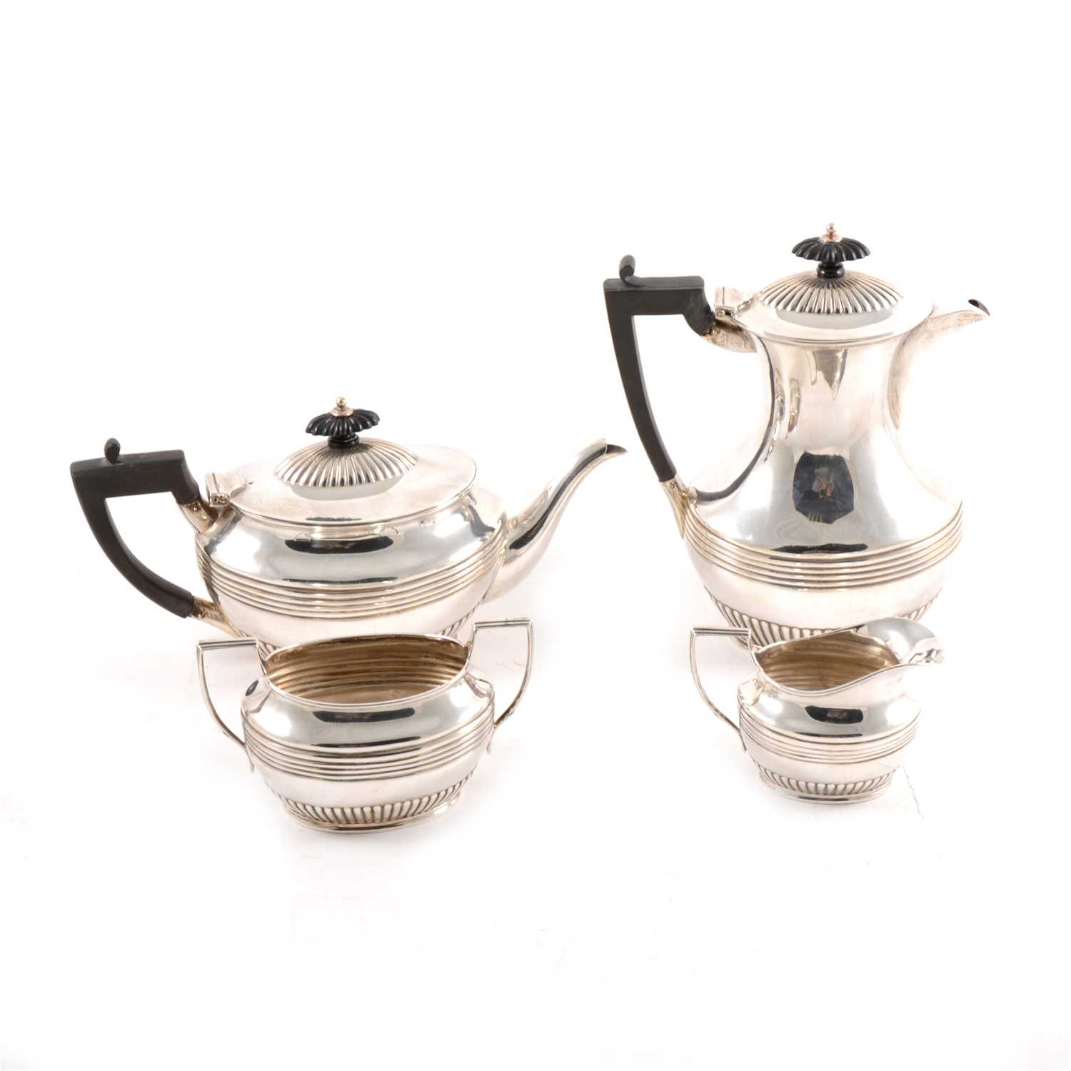 Lot 164 - A four piece Scottish silver tea set by Hamilton and Inches