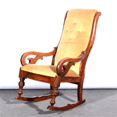 Lot 524 - A Victorian stained wood rocking chair, Old Gold dralon upholstery, ...