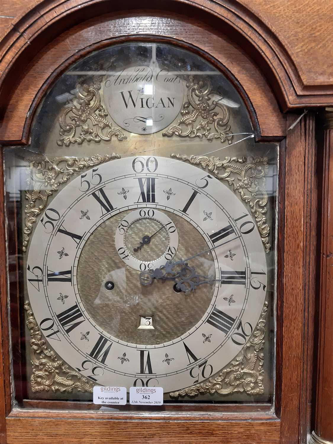 Lot 362 An oak longcase clock, signed Archibald