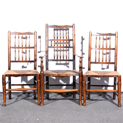 Lot 356 - A Harlequin set of eight Lancashire type spindle-back ash and fruitwood chairs, ...