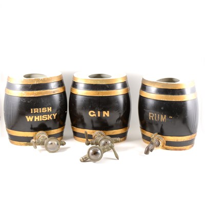 Lot 73 - Three pottery barrels with optics, Irish Whisky, Rum and Gin
