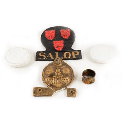 Lot 102 - Two reproduction insurance marks, including Salop Fire Office, and three blank pot lids.