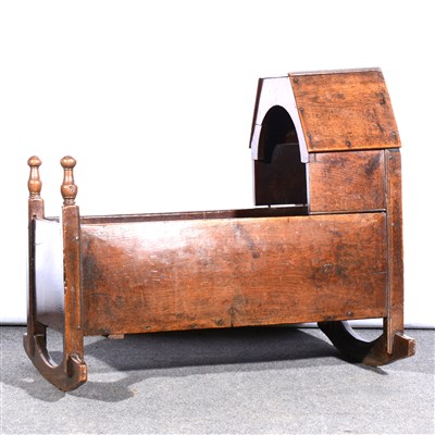 Lot 417 - George III joined oak cradle, boarded construction, canopy hood, length 87cm.